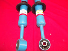 Load image into Gallery viewer, 2016-2023 Toyota Tacoma Hitachi Blue Strut Shock 48510-04222 OEM
