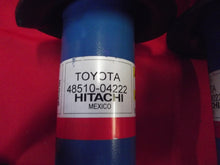 Load image into Gallery viewer, 2016-2023 Toyota Tacoma Hitachi Blue Strut Shock 48510-04222 OEM

