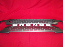 Load image into Gallery viewer, 2021-2026 FORD BRONCO GRILLE CARBONIZED GRAY WHITE LETTERING BADLANDS OEM
