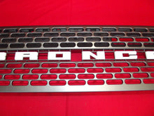 Load image into Gallery viewer, 2021-2026 FORD BRONCO GRILLE CARBONIZED GRAY WHITE LETTERING BADLANDS OEM

