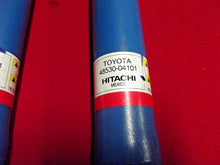 Load image into Gallery viewer, 2015-2021 TOYOTA TACOMA TRD SHOCKS REAR HITACHI FACTORY OEM 048530-04101
